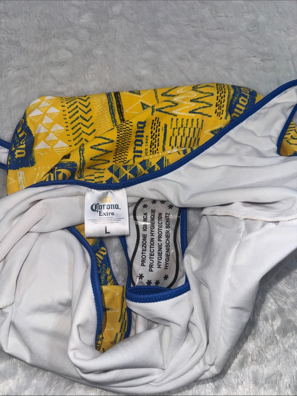Corona Women One-Piece Swimsuit in White with Blue Trim and Yellow Logo - Picture 5 of 8